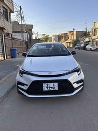 كورلا هايبرد موديل 2025. ماشيه. 8 الف. S بلاك ادش  لون صدفي داخل احمر ...