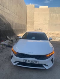 K5 للبيع موديل ٢٠٢٣ رقم بغداد بسمي سنويه جديده سياره ضربتها كلش بسيط م...