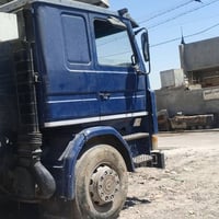 كابسة نفايات • شاحنة