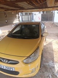 اكسنت • تكسي • رقم النجف