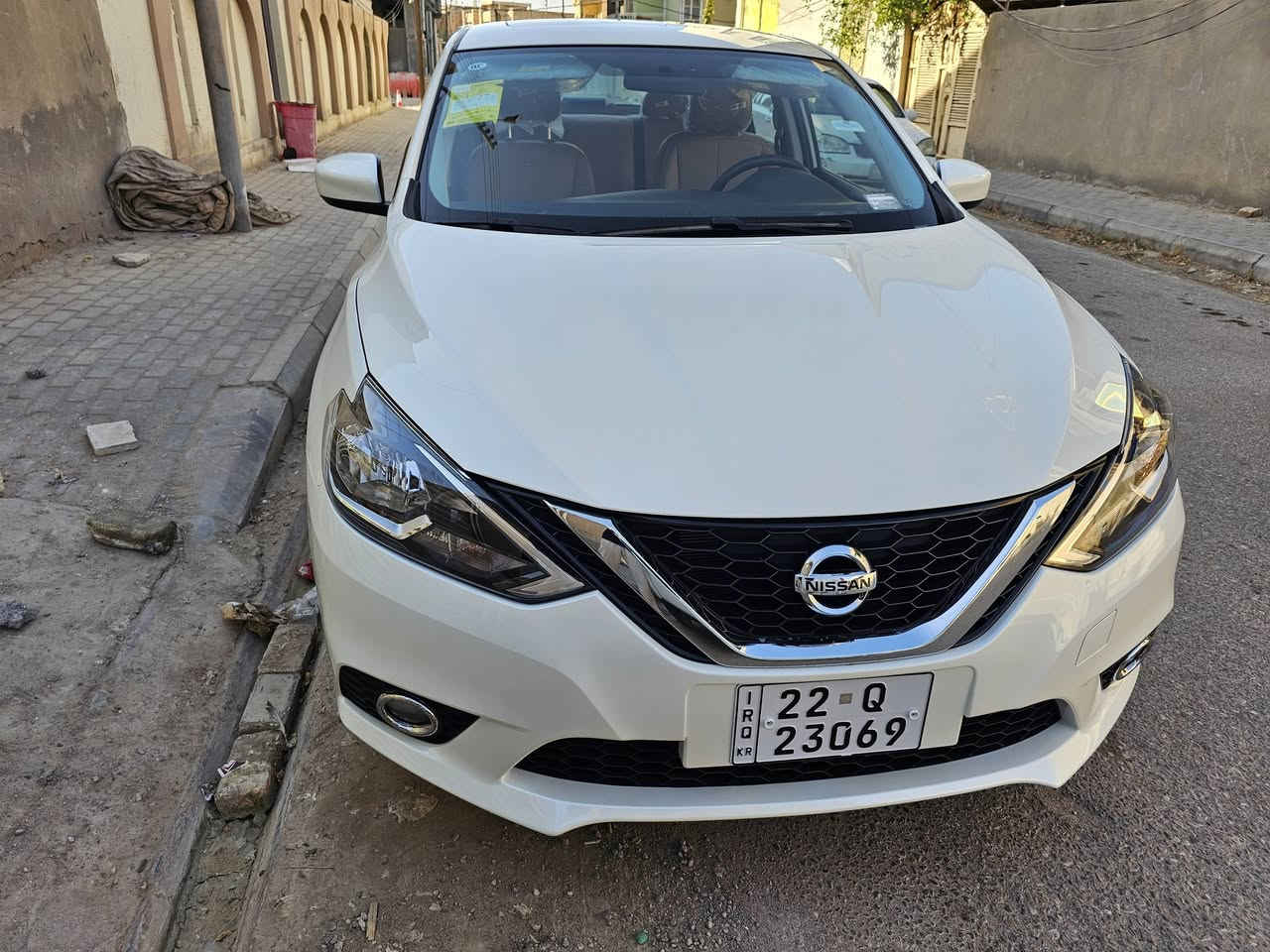 نیسان سنترا موديل 2025 بحالة الوكالة)
المواصفات والميزات

الفئة : VIP (أعلى صنف).

المحرك : 1600 CC اقتصادي وقوي).

التبريد قطعتين أمامي وخلفي).

الإضافات فتحة سقف بانوراما

العداد: ماشية 4000 کیلومتر فقط (شبه زیرو)

الضمان سيارة وكالة ومكفولة كفالة عامة 
رقم أربيل( تريد وكالة او تريد مداور ) 

السعر:

128 ورقة (12,800 دولار أمريكي).

للاستفسار والتواصل

رقم الهاتف: ***********
