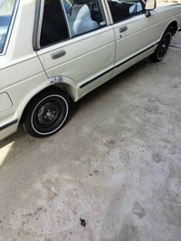 دادسن م٨٠ • ٢٠٠٠ • رقم بغداد ١٠٠٩٨