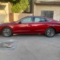 سوناتا ٢٠٢٤ هايبرد داخل ابيض ماشيه ١٧ الف كراسي كهرباء شاشه متصله انار...