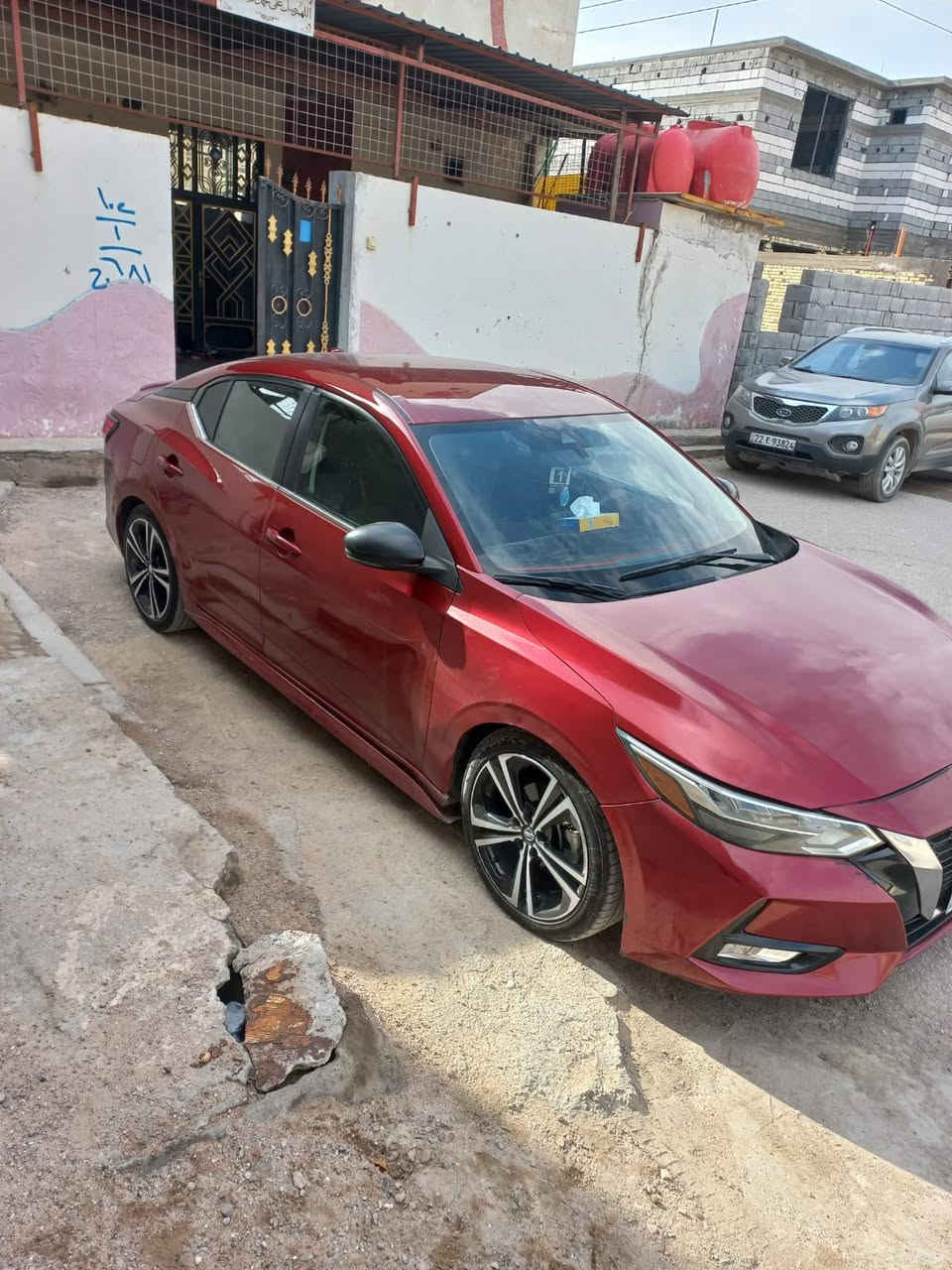 سنترا 2023 وارد  حادثهه بنيد وجاملق sr ماشيه 60كيلو سياره نضيفه كير مكينه من كلشي مواصفاتهه حلوه بصمه السياره رقم جديد اربيل مكاني بالبصره سعره 135/ ***********
