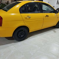 اكسند تكسي لبيع موديل 2010رقم كركوك مشروع وطني بيها دفتر بنزين محرك 16...