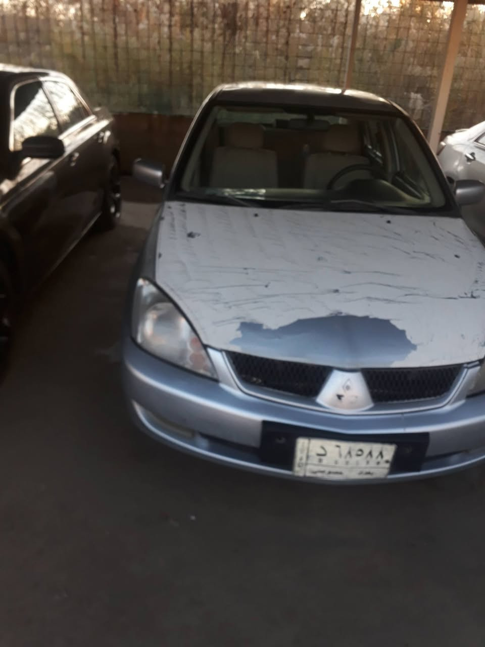 لانسر موديل ٢٠١١ رقم بغداد بيها صبغ قطع بدون ضربه سعر ٧٦ وبيها مجال ديالى جديد الشط الرقم ***********
