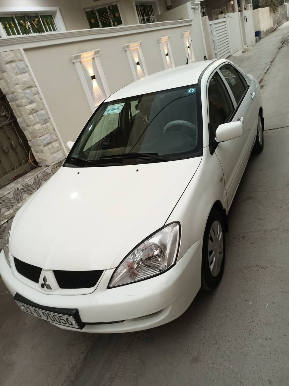 السلام عليكم شباب لانسر موديل 2011 رقم بغداد الدولي الجديد بسمي السياره مكفولة كفاله  عدا شبر بالباب مال سايق السياره تخم تاير جديد صدر جديد مكينه على وضع الشركه السياره كتب الشركه بيها سبير منازل سويجات عدد 2 السياره بلاجكتور زنون منضومه غاز السياره مالك اول من الشركه السعر 98 مكان السياره ديالى بعقوبة وهذا رقمي ***********
