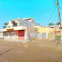 قطعة مع محلات • ٤٠٥م • حي المعمل