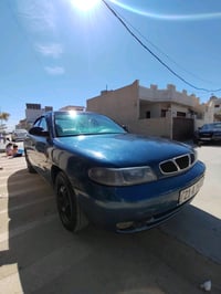 سياره نوبرا موديل 1998صبغ عام الجماليه سياره بي ضربه خفيف بدنه كدام فق...