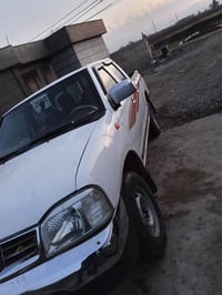 نیسان مۆدێل 2008  براوە ناوسورجام کارەبا ئاوێنە کارەبا سەیارەکە کامل ج...