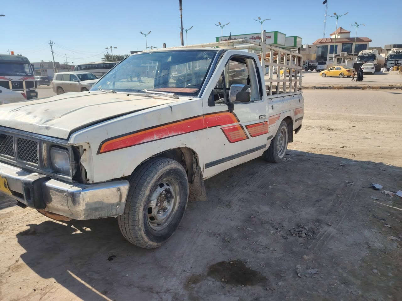 نيسان مديل ٨٩ لبيع بدون راعي يعني متوفي مكان حله مكينه وكير تيوته بخاخ رقم بغداد ١٥ ورقه ***********
