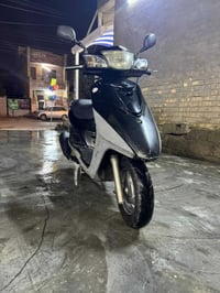 موتوسيكل • بريز ببغاء • برغي ما مفتوح