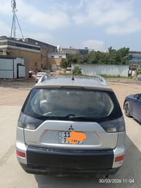 من رخصة مدير الكروب للبيع اوتلاندر 2009 مكينة 2400 رقم بغداد انكليزي ب...
