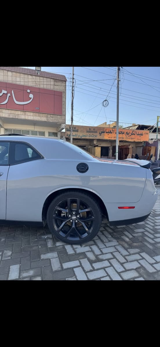 السلام عليكم
للبيع فقط
دودج تشالنجر GT موديل 2022
* محرك 3.6 V6
* ممشى 78 ألف كم
* رقم بغداد جديد
* لون سموك مميز
* مواصفات GT (شفتات، سبورت مود، شاشة، زينون…)
* حادثها جاملغات الوره و بنيد 
* بدون ايرباك
***********
