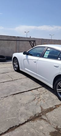 جارجر 2012 رقم اربيل هزه ما صاقطه السياره كلين هنا بالعراق باب السايق ...