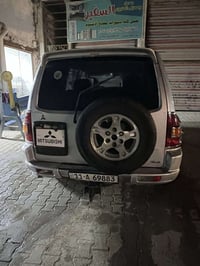 بايجيرو موديل ٢٠٠١ مكفوله من صبغ وضربه رقم نكليزي بغداد سنويه ل٢٠٣٠ حد...