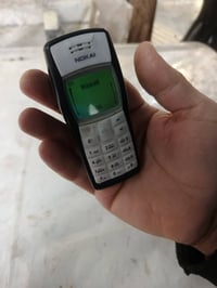 نوكيا ١١٠٠ • شرط اصلي • شاحن وتوصيل