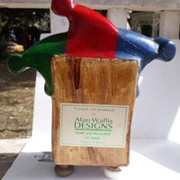 ساعة كواتز • تمثال بهلوان • ٢٣سم×٢٠سم