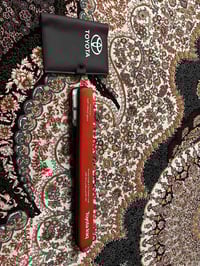 مثلث تحذير • حافظة جلد • بغداد