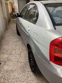 اكسنت ١٦٠٠ • ٢٠٠٩ • تحويل باسمي