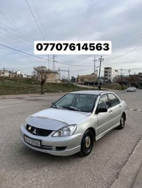 لانسر ٢٠٠٥ • أوتوماتيك • كانت تاكسي