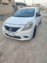 للبيع نيسان فيرسا موديل 2014 بيها عته بالكير بالنمره الأولى والثانية و...