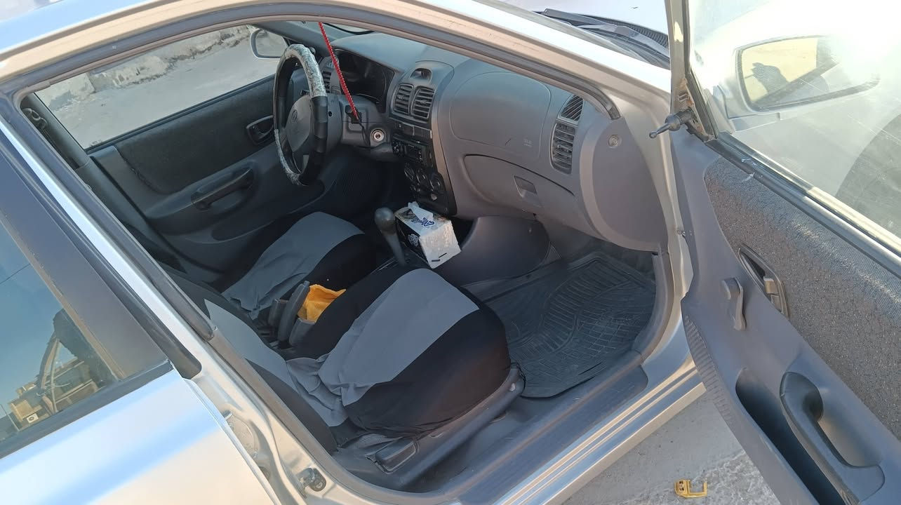 سلام عليكم اكسنت افيرنه موديل 2001  مصبوغة عام بدون ضربة محرك 1600 رقم بغداد انكليزي باقي ع استلام لوحات تبريد عوزة بس قايش السيارة وارد امريكي بدون ضرر ليبل واحد كلهة سيارة جاهزة  السيارة  بلكوت موجودة  ***********اتصل ع الرقم
