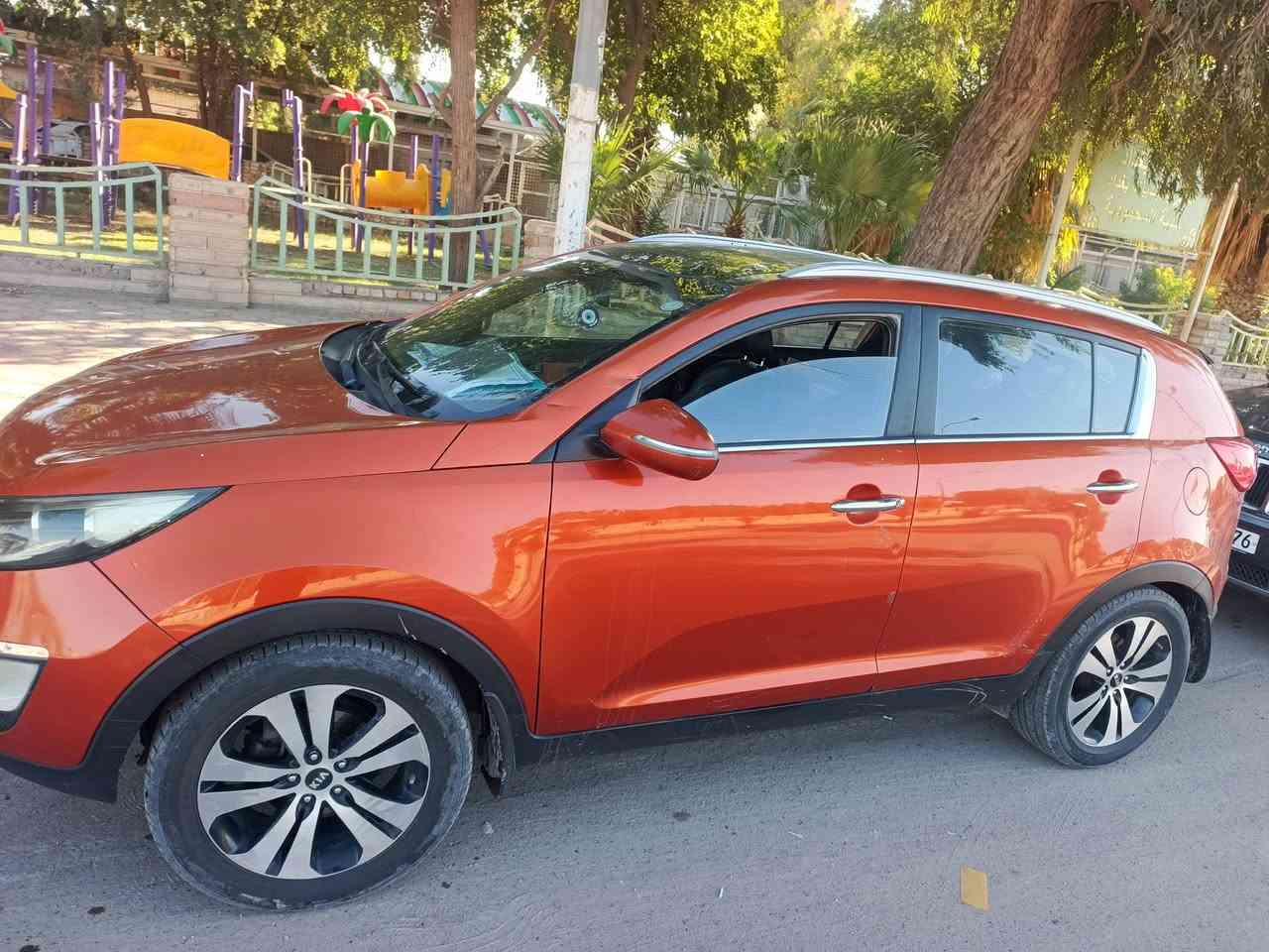 اسبورتج 2011
خليجي مكفول لون مشمشي داخل مشمشي بنوراما ومكفوول بيها طخات كلش بسيطه رقم اربيل دولي بسمي 
السياره ب135 وبيها مجال 
***********
