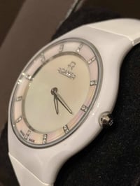 ساعة ROAMER سويسري أصلي بطارية بدن سيراميك  القطر ٤٠ مقاوم للماء ٣٠م س...