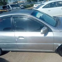 كيا ريو 2002 رقم بغداد شرط تحويل  محرك1600مرغوب مكفول من تنقيص و تبخير...