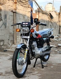 دراجة نارية • موديل 25 • كفالة عامة