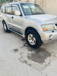 باجيرو للبيع سياره جاهزه مكينه وكير وتبريد كلهه بشرط فول مواصفات كشتات...