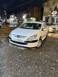 بيجو فرنسي 307 موديل 2005  ماشيه 200 الف  بلادي بدون صبغ  هزه جديده  س...