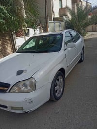 ساسوكي 2006 رقم بغداد سنويه 2027 السياره فتحه تحكم ستيرن كشن كهربائي ح...