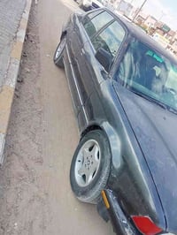 بيم 740اصل موديل 93مكينه 8 رقم بغداد نكليزي سنويه جديده كير ومحرك حداد...