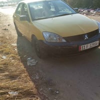 لانسر • ٢٠١٠ • اوتوماتيك