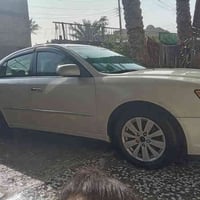 سوناتا موديل 2009وارد امريكي لون أبيض محرك ست استندر حدادة الصدر الأما...