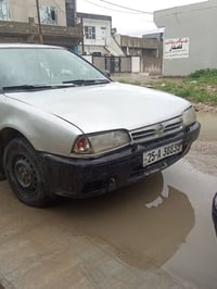 نيسان بريمر • رقم إنكليزي • بنزين