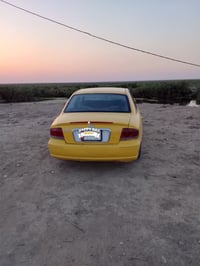 للبيع سوناتا وفود موديل ٢٠٠٢ رقم بغداد الماني.مكينه وكير كامري .راعيهة...