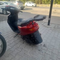 دراجه فراشه مكينه ما مفتوحه جديده سعر 350وبيها مجال رقم 07884050766