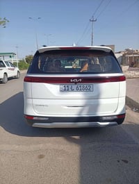 كيا كرنفال كفالة عامه 2023 غاز وبانزين بغداد بسمي 10راكب محرك 3500  شا...