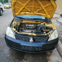 عندي سياره لانسر للبيع موديل 2010 07826576545