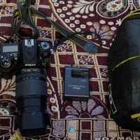 نيكون 7200 • عدسه بلاديه • بطاريتين