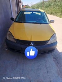 لانسر 2010 سيارة جاهزة للاستفسار على الرقم 07716232927