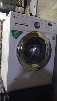 مكاني غزالية سعرها ٢٢٥ الف LG 8 كيلو 07710546307