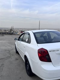 اوپترا • اوتوماتيك • ٢٠١٠