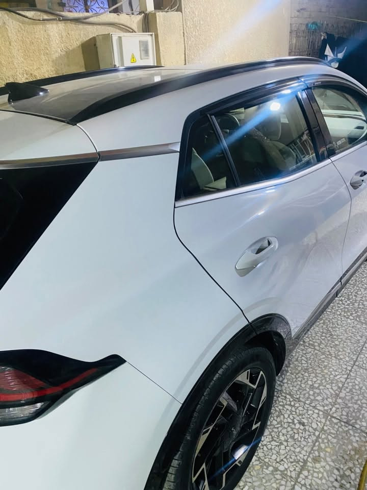 ⸻
السلام عليكم 

🚘 للبيع كيا سبورتج خليجي 2023

📍 رقم بغداد الجديد – السيارة باسمي 
هزة جديدة 

المواصفات:
✅ سقف بانوراما
✅ بصمة تشغيل وبصمة أبواب
✅ تشغيل عن بُعد
✅ شاشة Apple CarPlay
✅ كاميرا خلفية
✅ كشنات كهربائية مع تدفئة
✅ تبريد قطعتين
✅ رادار جانبي
✅ حساسات أمامية وخلفية
✅ هند بريك إلكتروني (بصمة)

ملاحظة:
🔹 السيارة بيها بارد بسيط كلش بل باب موضح بل صور 

💰 السعر المطلوب:205$ والشراي ما ارجعة 
📞 للاستفسار: ***********

📍 العنوان: بغداد – الكمالية
