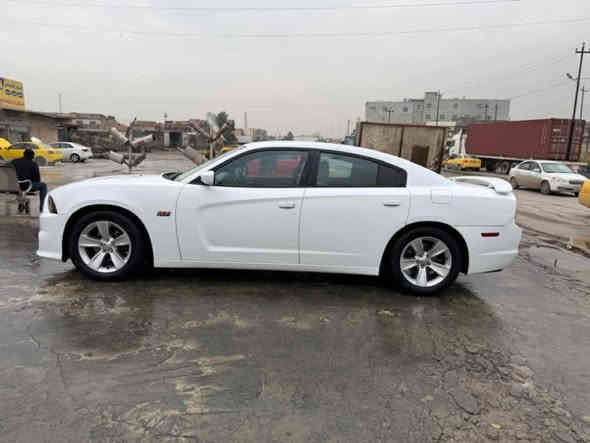 السلام عليكم للبيع دودج تشارجر بها قطعتين مكلف بالنشر 2012 بيها بوند وكامل بدون دواخل سياره حيل حلوه رقم نينوى  بيها صبغ قطعتين بدون دواخل بوند وشاملغ جير مكينه اكسن كله شرط السعر سعر 160 وبيها مجال شيء بسيط كاربون***********
