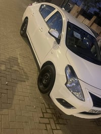 نيسان صني هندي بيها صبغ يم قبق عل كد شبر البانزين والباب كارت جديده كل...