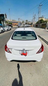 سياره نيسان سني للبيع موديل 2025 بغداد ماشيه 15 الف  مكفوله كفاله عامه...